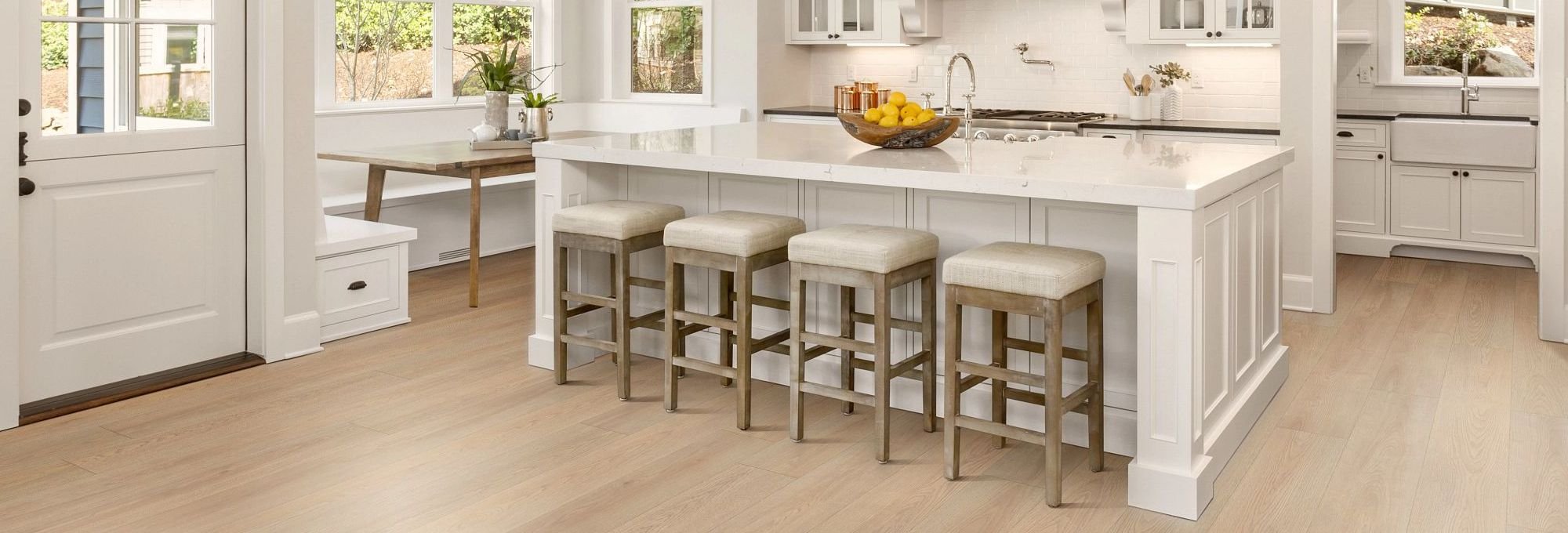 Kitchen with wood-look luxury vinyl flooring from Brennan's Carpet in Hailey, ID